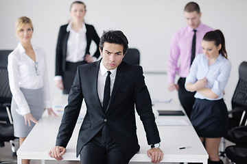 Image showing young business man at meeting