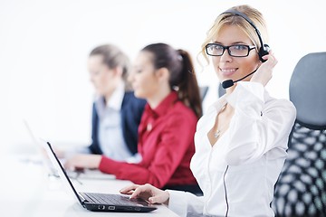 Image showing business woman group with headphones