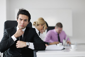 Image showing young business man at meeting