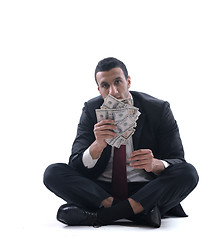 Image showing Business man holding money