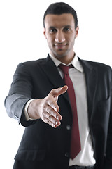 Image showing business man giving you a hand shake