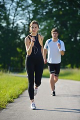 Image showing Young couple jogging at morning