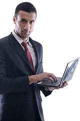 Image showing business man work on mini laptop