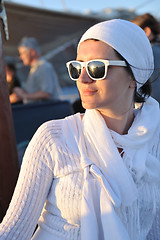 Image showing Greek woman on the streets of Oia, Santorini, Greece