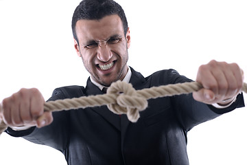 Image showing business man with rope isolated on white background