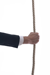 Image showing business man with rope isolated on white background