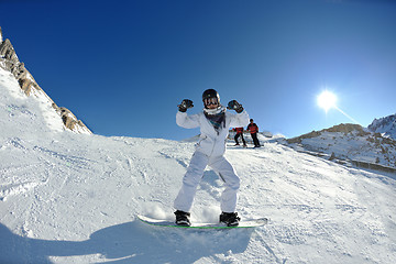 Image showing skiing on fresh snow at winter season at beautiful sunny day