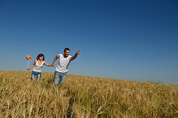 Image showing happy couple in wheat field