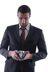 Image showing Business man holding money