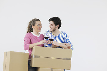 Image showing Young couple moving in new home