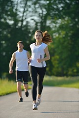 Image showing Young couple jogging at morning