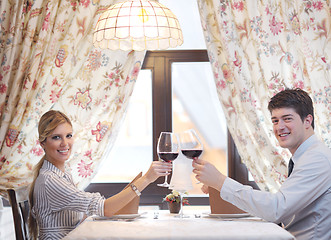 Image showing young couple having dinner at a restaurant