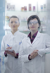 Image showing team of pharmacist chemist woman  in pharmacy drugstore