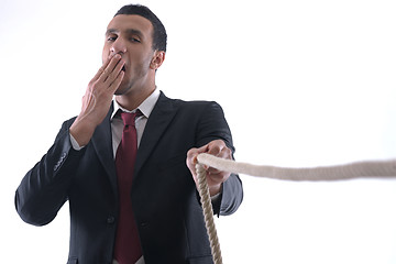 Image showing business man with rope isolated on white background