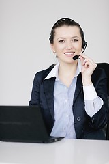 Image showing business woman group with headphones