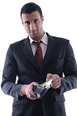 Image showing Business man holding money