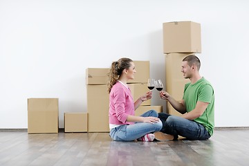 Image showing Young couple moving in new house