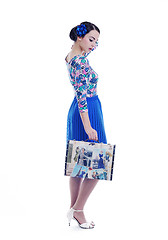 Image showing pinup retro  woman with travel bag isolated