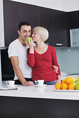 Image showing young couple have fun in modern kitchen