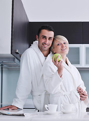 Image showing young couple have fun in modern kitchen