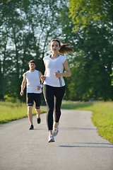 Image showing Young couple jogging at morning