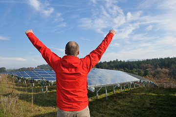 Image showing Male solar panel engineer at work place