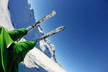 Image showing skiing on fresh snow at winter season at beautiful sunny day