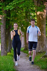 Image showing Young couple jogging