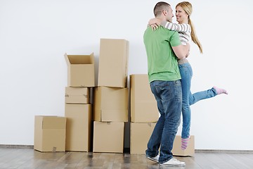 Image showing Young couple moving in new house