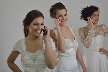 Image showing portrait of a three beautiful woman in wedding dress