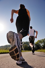 Image showing Young couple jogging