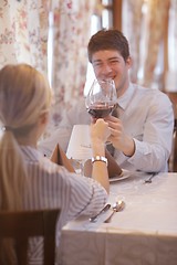 Image showing young couple having dinner at a restaurant