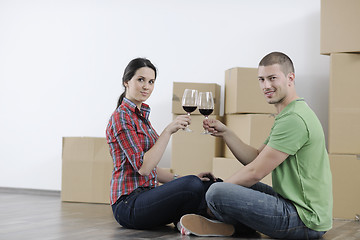 Image showing Young couple moving in new home