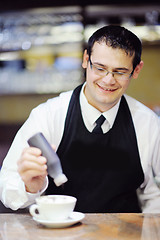 Image showing Barista prepares cappuccino