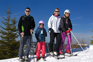 Image showing portrait of happy young family at winter