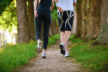 Image showing Young couple jogging at morning