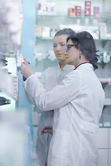 Image showing team of pharmacist chemist woman  in pharmacy drugstore