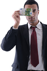 Image showing Business man holding money