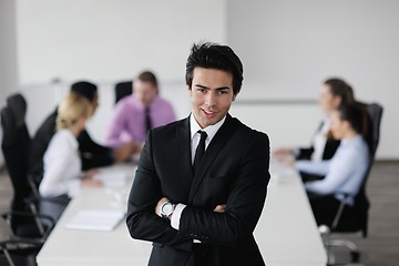 Image showing young business man at meeting