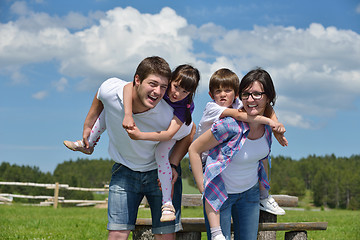 Image showing happy young family have fun outdoors