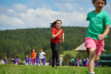 Image showing happy kids group  have fun in nature