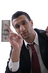 Image showing Business man holding money