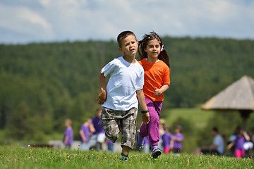 Image showing happy kids group  have fun in nature