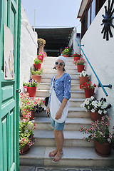 Image showing Greek woman on the streets of Oia, Santorini, Greece