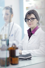 Image showing team of pharmacist chemist woman  in pharmacy drugstore