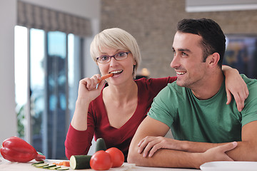 Image showing young couple have fun in modern kitchen