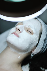 Image showing woman with facial mask in cosmetic studio