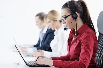 Image showing business woman group with headphones