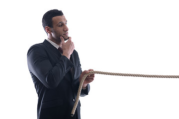 Image showing business man with rope isolated on white background