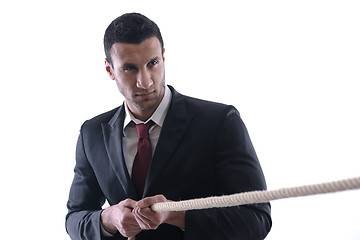 Image showing business man with rope isolated on white background